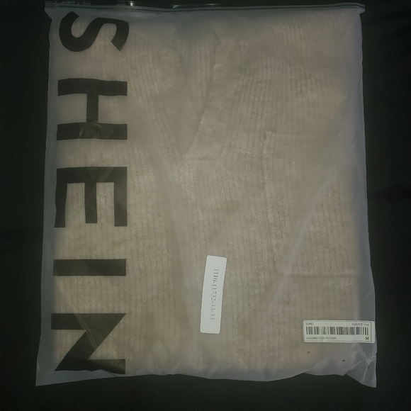 Sweater with front pocket and V neck collar - Picture 6 of 6